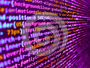 New technology revolution. Creative Js HTML5 closeup set on background. Data encryption security code on a computer display, close