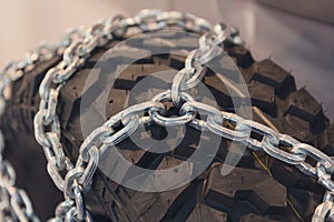 New tires with chains close up
