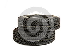 New tires pile isolated on white background