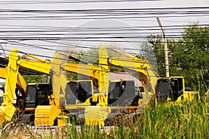 New tonnage excavators awaiting sale at site photo
