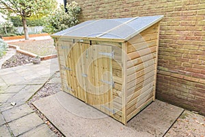 New tool shed in a garden.