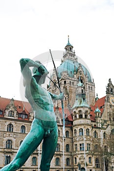 New Townhall in Hannover, Germany. Statue in front of Hannover New townhall