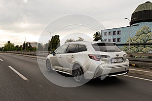 New Toyota Corolla, 2019 model in urban environment. Car in motion. Front view of the car.