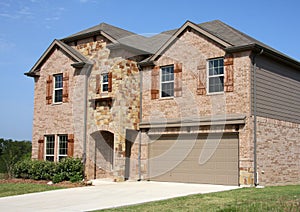 A new two floors brick house in suburban