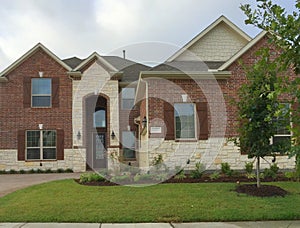 A new two floors brick and rock house