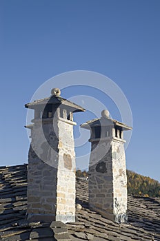 New two stone chimneys with stone balls