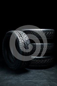 New tyres background. Car tyres close up