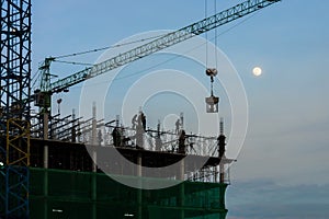 The new under construction building and tower canes