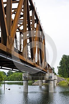 Rusty railway bridge across the Washougal river