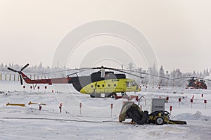 New Urengoy, YaNAO, North of Russia. Helicopter UTair and Konvers avia in the local airport on the service. January 06, 2016