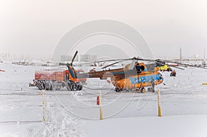 New Urengoy, YaNAO, North of Russia. Helicopter UTair and Konvers avia in the local airport on the service. January 06, 2016 Edi