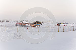 New Urengoy, YaNAO, North of Russia. Helicopter UTair and Konvers avia in the local airport on the service. January 06, 2016
