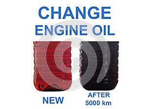 New and used engine oil in transparent bottles