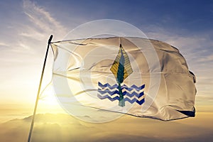 New Valley Governorate of Egypt flag textile cloth fabric waving on the top sunrise mist fog