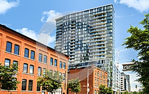 New versus old architectural building in Griffintown borough of Montreal