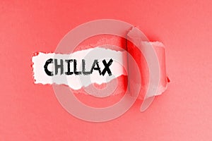 New vulgar English word Chillax written on torn yellow paper