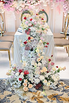 New wedding decoration with multi floral concept indoors.