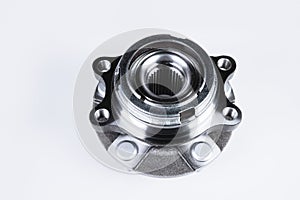 New Wheel hub assembly with bearing. This is part of the car suspension on a gray background with a gradient. The