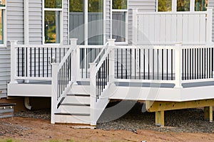 new white deck from the back of the house