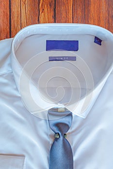 New white shirt with blue necktie