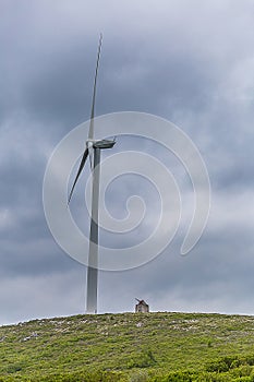 New Wind Turbine and Old Wind Mill