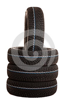 New winter tires isolated over white