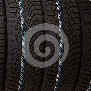 New winter tires isolated over white