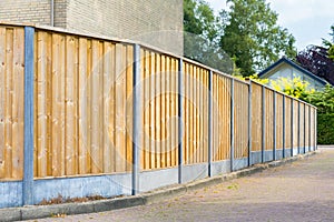 New wooden fence along the street