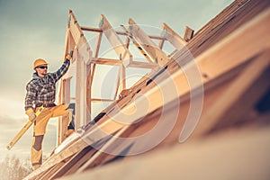 New Wooden House Construction Worker photo