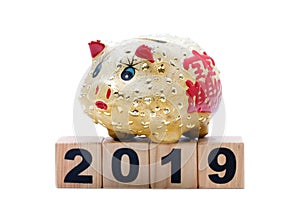 New Year 2019: piggy bank and building blocks