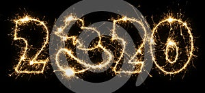 New Year 2020 with symbol of the year rat made by sparkler . Number 2020 and sign written sparkling sparklers . Isolated on a