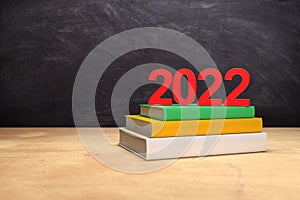 New Year 2022 Creative Design Concept with books