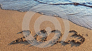 New Year 2023 is coming concept on tropical beach.