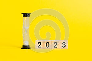 New Year 2023 sand timer. Resolution, time, plan, goal, motivation, reboot, countdown and New Year holiday concepts