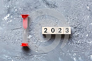 New Year 2023 sand timer. Resolution, time, plan, goal, motivation, reboot, countdown and New Year holiday concepts