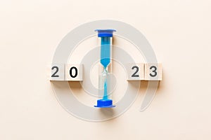 New Year 2023 sand timer. Resolution, time, plan, goal, motivation, reboot, countdown and New Year holiday concepts