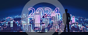 New Year 2024 Business man with metaverse neon city technology background