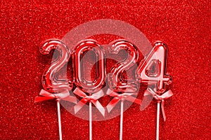 New Year 2024 - Old RED numbers on on glitter silver dust background