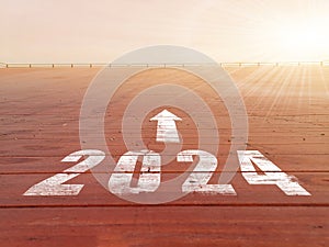 New year 2024. Text of 2024 has written on the ground. Straight forward concept. Keep going to the goal. target and challenge