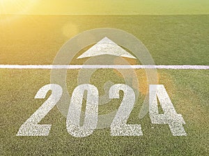 New year 2024. Text of 2024 has written on the ground. Straight forward concept. Keep going to the goal. target and challenge