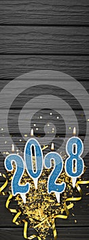 New year 2028 celebration greeting card background blue numbers 2028 with golden party decoration, confetti on dark