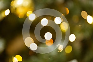 New year backdrop. Blurred background with golden bokeh. Christmas mock-up or greeting card. Holiday background. Soft focus