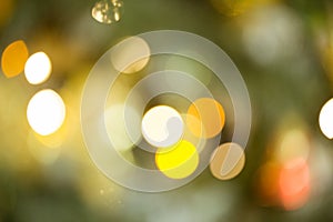 New year backdrop. Blurred background with golden bokeh. Christmas mock-up or greeting card. Holiday background. Soft focus