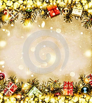 New Year. Background, frame of Christmas tree branches and Christmas decorations. Golden snow. Free space for text.
