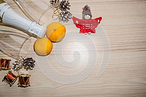 new year background with toy, Champagne and tangerines. Christmas Celebration