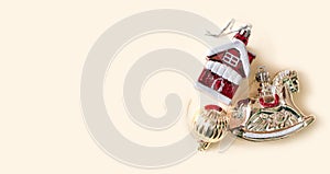 New year banner with christmas toys horse, red house, golden ball. Greeting card template