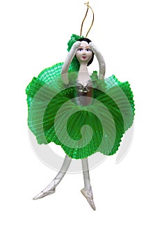 New year beautiful vintage old ballerina toy in green dress on white background