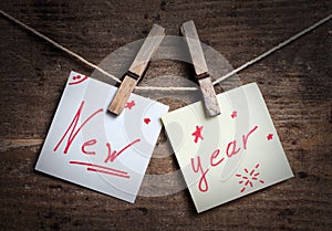 New Year card on wooden background