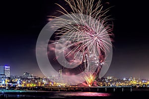 New Year Celebrations fireworks in red and yellow lid up the sky above Shark Rock Pier at Hobie Beach in Port Elizabeth