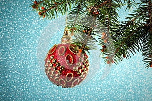 New Year. Christmas. Beautiful round red Christmas toy hanging o